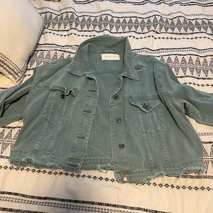 Super cute distressed jean jacket
